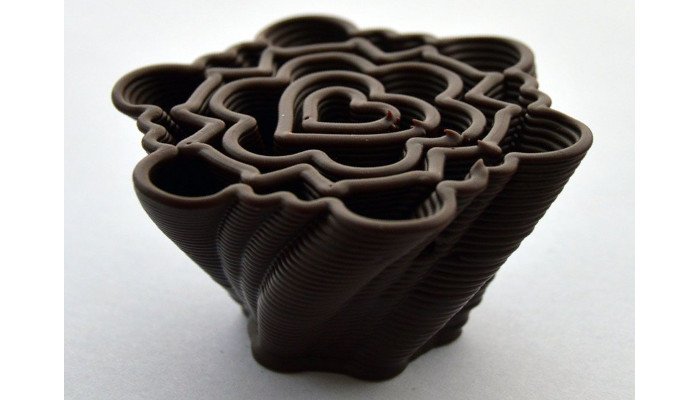 3d printed chocolate print of a heart inside a snowflake