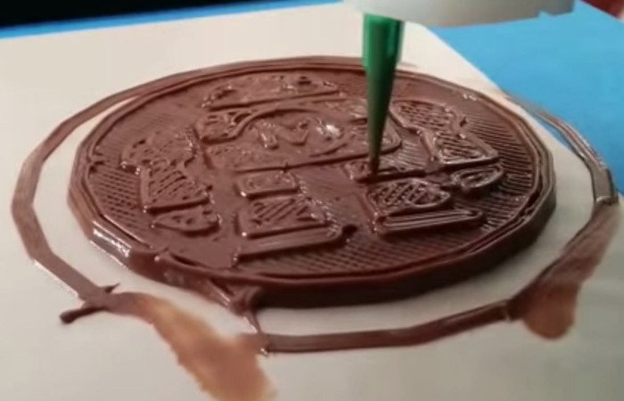 Chocolate food being 3D printed