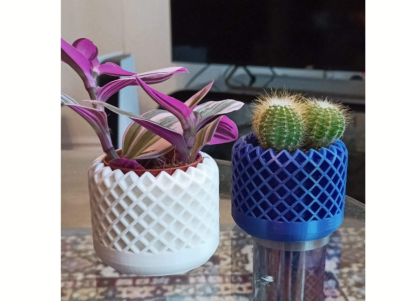 Two plant pots we printed using the Mirror Mode function on the Sovol SV04's dual extruders.