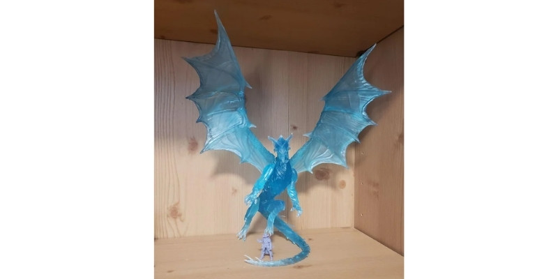 3D printed arcane dragon in elegoo water washable clear blue resin