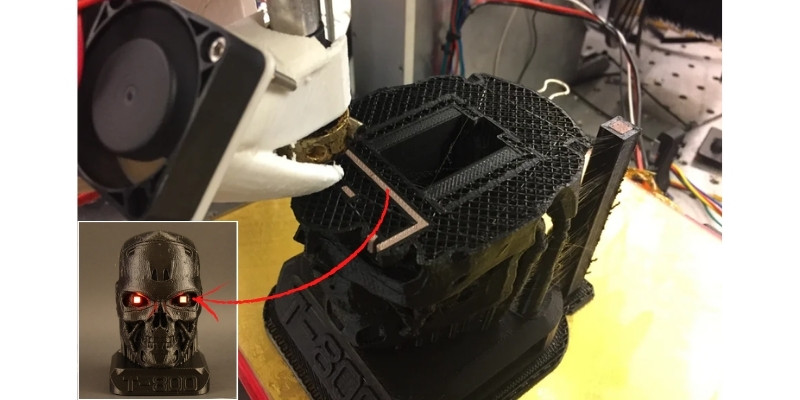 3D printing circuit for the glowing LED eyes on half finished terminator head model