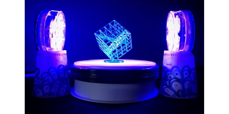 DIY UV resin curing station with RGB puck lights and motorized turntable